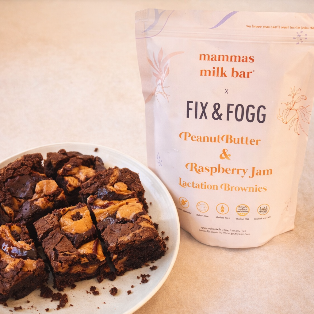 Peanut Butter & Raspberry Jam lactation brownies from Mamma's Milk Bar x Fix & Fogg on a plate with packaging.